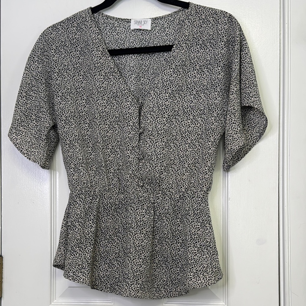 Sienna Sky Black and White Peplum Blouse with Short Sleeves